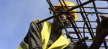 Construction workers work on an overpass bridge, a section of the Mombasa-Nairobi standard gauge railway (SGR), in Emali, Kenya October 10, 2015. The China Road and Bridge Corporation (CRBC) tasked with the construction work at a cost of 3.8 billion U.S. dollars is due for completion in mid-2017. REUTERS/Noor Khamis (Newscom TagID: rtrlseven493562.jpg) [Photo via Newscom]