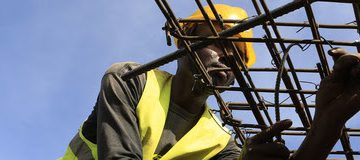 Construction workers work on an overpass bridge, a section of the Mombasa-Nairobi standard gauge railway (SGR), in Emali, Kenya October 10, 2015. The China Road and Bridge Corporation (CRBC) tasked with the construction work at a cost of 3.8 billion U.S. dollars is due for completion in mid-2017. REUTERS/Noor Khamis (Newscom TagID: rtrlseven493562.jpg) [Photo via Newscom]