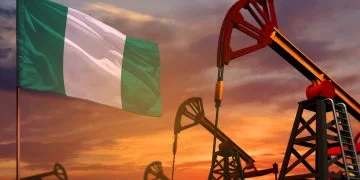 Nigeria oil industry concept, industrial illustration. Nigeria flag and oil wells and the red and blue sunset or sunrise sky background - 3D illustration