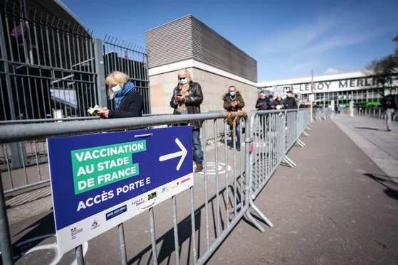 Opening of the vaccinodrome installed in the Stade de France this morning. A long queue in front of the gates, the objective: to vaccinate 10,000 people per week to fight against the health crisis. Saint-Denis, on 07/04/2021. Ouverture du vaccinodrome installe dans le Stade de France ce matin. Une longue queue devant les grilles, l objectif : vacciner 10000 personnes par semaine pour lutter contre la crise sanitaire. Saint-Denis, le 07/04/2021.//CEZARDGABRIELLE_1911.14188/2104071115/Credit:Gabrielle CEZARD/SIPA/2104071117 (Newscom TagID: sfphotosfour918691.jpg) [Photo via Newscom]