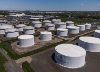 Storage tanks at a Colonial Pipeline Inc. facility in Avenel, New Jersey, U.S., on Wednesday, May 12, 2021. Motorists across a broad swath of the U.S. East Coast and South are struggling to find gasoline and diesel as filling stations run dry amid the unprecedented pipeline disruption caused by a criminal hack.