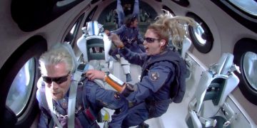 Billionaire Richard Branson makes a statement as crew members Beth Moses and Sirisha Bandla float in zero gravity on board Virgin Galactic's passenger rocket plane VSS Unity after reaching the edge of space above Spaceport America near Truth or Consequences, New Mexico, U.S. July 11, 2021 in a still image from video.    Virgin Galactic/Handout via REUTERS.  NO RESALES. NO ARCHIVES. THIS IMAGE HAS BEEN SUPPLIED BY A THIRD PARTY.