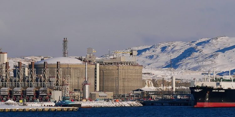 Hammerfest, Norway - 03/02/2019: Closeup view of tanker anchoring at Europe's largest liquefied natural gas (LNG) site on Melkøya island in the arctic sea in winter time.