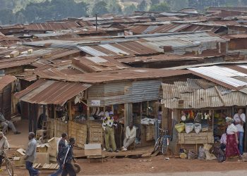 Open market Gigega Burundi East Africa overview with buildings with corrugated metal roofs