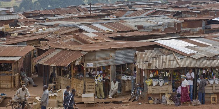 Open market Gigega Burundi East Africa overview with buildings with corrugated metal roofs