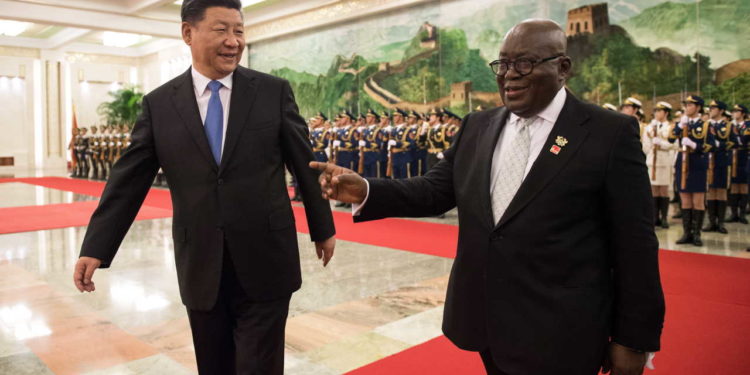 epa06988890 China's President Xi Jinping (L) and Ghana's  President Nana Akufo-Addo (R) review the Chinese People's Liberation Army honour guard during the welcome ceremony at the Great Hall of the People in Beijing, China, 01 September 2018. Akufo-Addo is in China for the Forum on China-Africa Cooperation which will be held 03 and 04 September in Beijing.  EPA/NICOLAS ASFOURI / POOL