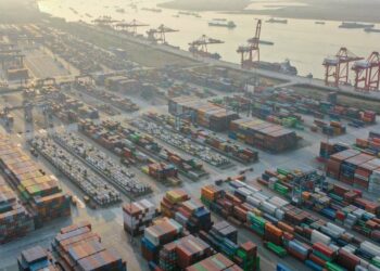This aerial photo taken on January 3, 2023 shows cranes and shipping containers at Nanjing port in China's eastern Jiangsu province. China OUT
(Photo by AFP)