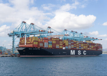 Algeciras, Cadiz Spain; 20 January 2022: A MSC freighter is docked on harbor, Container ship at industrial port in import export business logistic and transportation of international