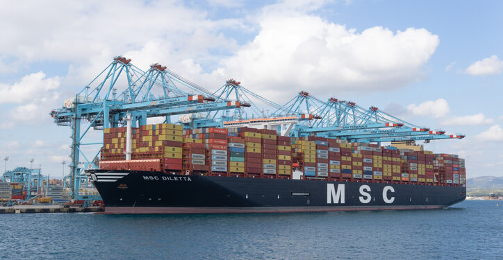 Algeciras, Cadiz Spain; 20 January 2022: A MSC freighter is docked on harbor, Container ship at industrial port in import export business logistic and transportation of international