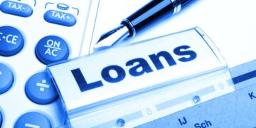 loan application in business folder showing financial investment concept