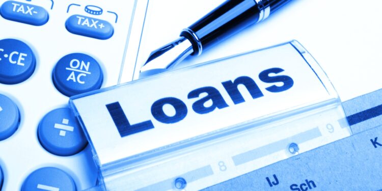 loan application in business folder showing financial investment concept