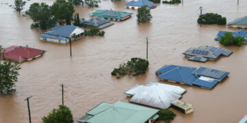 A supplied image shows flood-affected properties in Lismore, NSW on Monday, February 28, 2022. (AAP Image/Supplied by the Department of Defence, Bradley Richardson) NO ARCHIVING, EDITORIAL USE ONLY