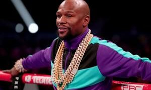 ARLINGTON, TEXAS - MARCH 16: Floyd Mayweather Jr. stands in the ring before Errol Spence Jr takes on Mikey Garcia in an IBF World Welterweight Championship bout at AT&T Stadium on March 16, 2019 in Arlington, Texas. (Photo by Tom Pennington/Getty Images)