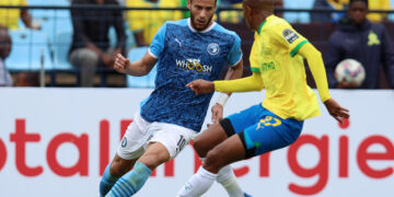 Ramadan Sobhi of Pyramids challenged by Thapelo Morena of Mamelodi Sundowns during the CAF Champions League 2023/24 match between Mamelodi Sundowns and Pyramids at the Loftus Stadium, Pretoria on the 10 December 2023 ©Muzi Ntombela/BackpagePix