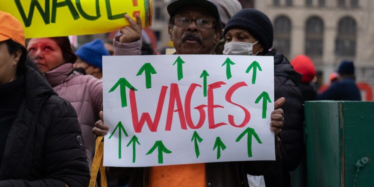 New York City, NY USA November 15, 2022. Labor Union members held a rally at City Hall demanding an increase in the minimum wage in New York.