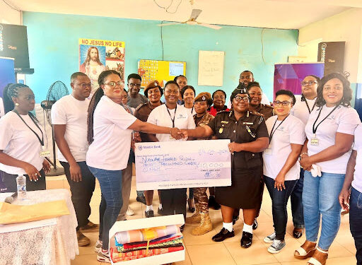 Magaret Obimpeh, Head, Affluent Clients, Stanbic Bank Ghana presenting cheque and to Mrs. Victoria Adewodah, Assistant Director of Prisons