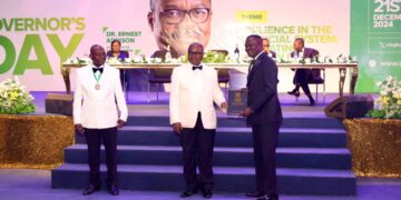 Governor Ernest Addison presenting the Honorary Status to Victor Yaw Asante, FirstBank Ghana MD/CEO. Looking on is the CIB, Ghana President, Benjamin Amenumey