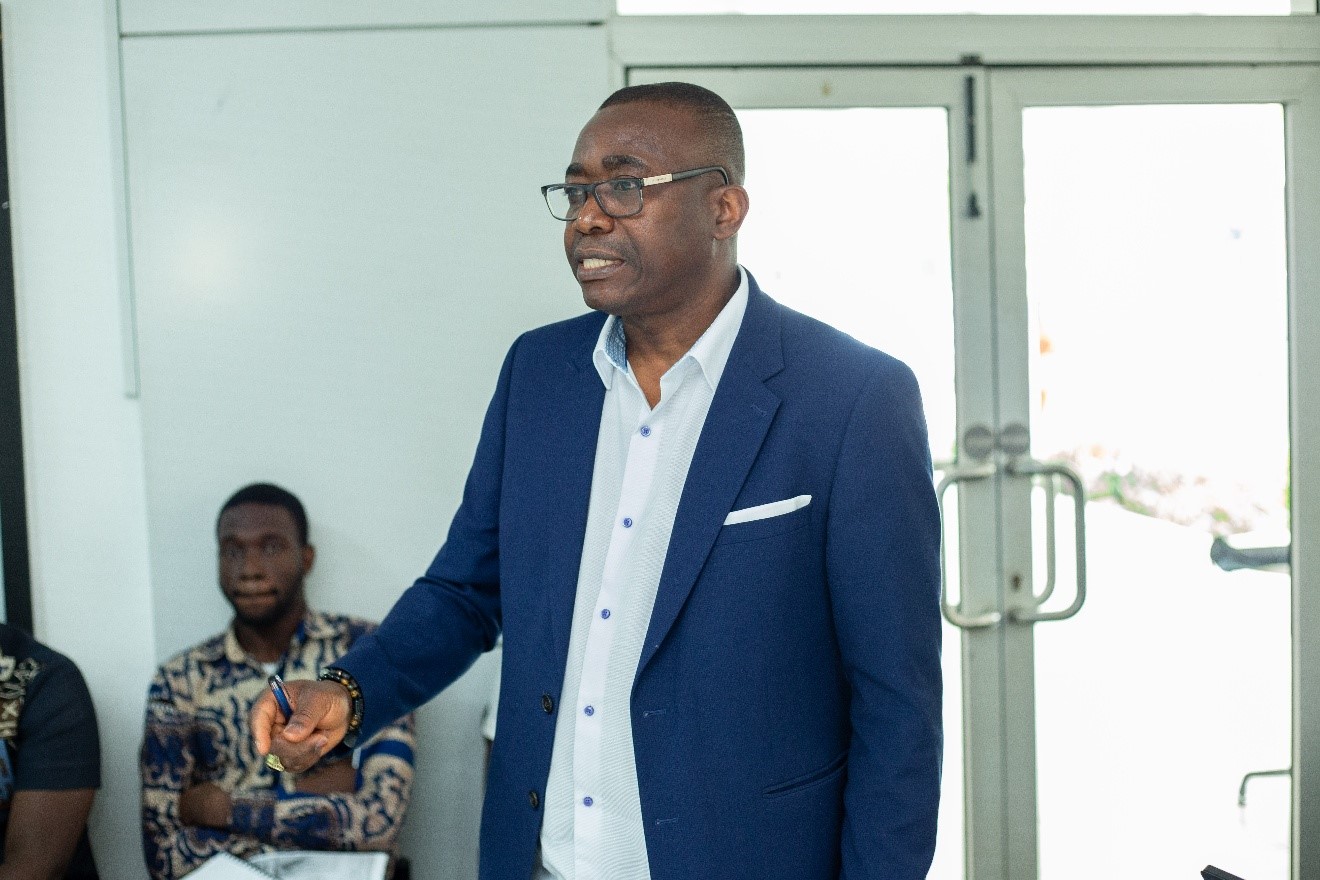 Dr Ofori-Kuragu, welcoming participants