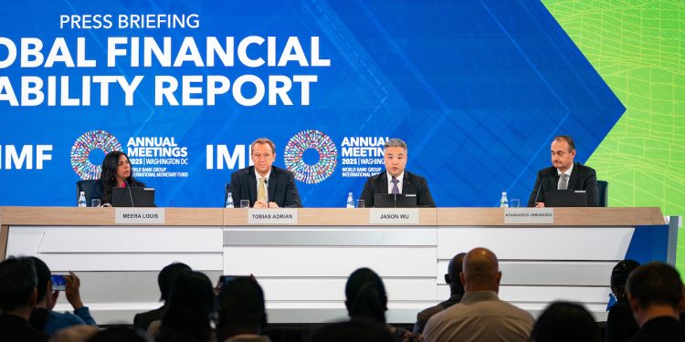 Director of the IMF Monetary and Capital Markets Department Tobias Adrian, Assistant Director Jason Wu, and Deputy Director Athanasios Vamvakidis are joined by Communications Officer Meera Louis to brief the press on the findings of the October 2025 IMF Global Financial Stability Report during the 2025 Annual Meetings of the World Bank Group and International Monetary Fund in Washington, DC, on October 14, 2025.  IMF Photo/Allison Robbert