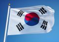 South Korea flag waving against clean blue sky, close up, isolated with clipping path mask alpha channel transparency