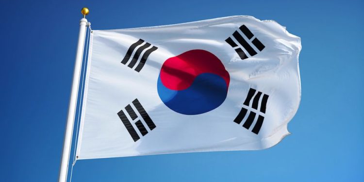 South Korea flag waving against clean blue sky, close up, isolated with clipping path mask alpha channel transparency