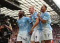 MANCHESTER, ENGLAND - SEPTEMBER 13: Erling Haaland of Manchester City celebrates scoring his team’s first goal with teammates during the Premier League 2026/27 match between Manchester United and Manchester City at Old Trafford on September 13, 2026 in Manchester, England. (Photo by Michael Regan/Getty Images)