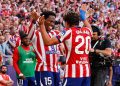 Atletico Madrid's Canadian forward #15 Jonathan David (L) celebrates scoring his team's second goal during the Spanish league football match between Club Atletico de Madrid and Real Madrid CF at the Metropolitano stadium in Madrid on September 20, 2026. (Photo by Oscar DEL POZO / AFP via Getty Images)