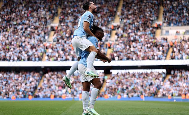 MANCHESTER, ENGLAND - SEPTEMBER 20: Antoine Semenyo of Manchester City celebrates scoring his team’s third goal with teammate Rayan Cherki during the Premier League 2026/27 match between Manchester City and Sunderland at Etihad Stadium on September 20, 2026 in Manchester, England. (Photo by Carl Recine/Getty Images)