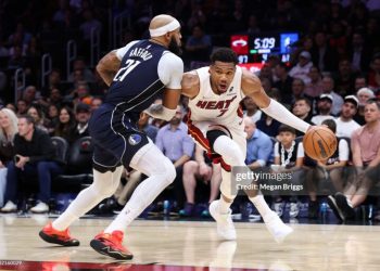MIAMI, FLORIDA - OCTOBER 26: Giannis Antetokounmpo #7 of the Miami Heat drives against Daniel Gafford #21 of the Dallas Mavericks during the fourth quarter of the game at Kaseya Center on October 26, 2026 in Miami, Florida. NOTE TO USER: User expressly acknowledges and agrees that, by downloading and or using this photograph, User is consenting to the terms and conditions of the Getty Images License Agreement. (Photo by Megan Briggs/Getty Images)
