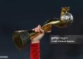 SYDNEY, AUSTRALIA - AUGUST 20: A Spain player holds up the FIFA Women's World Cup Trophy after the FIFA Women's World Cup Australia & New Zealand 2023 Final match between Spain and England at Stadium Australia on August 20, 2023 in Sydney, Australia. (Photo by Cameron Spencer/Getty Images)