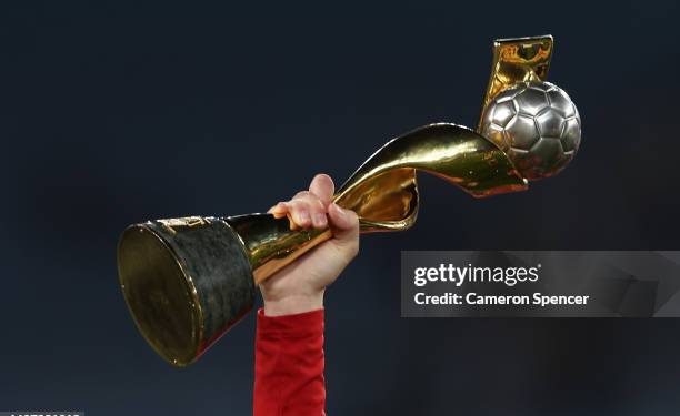 SYDNEY, AUSTRALIA - AUGUST 20: A Spain player holds up the FIFA Women's World Cup Trophy after the FIFA Women's World Cup Australia & New Zealand 2023 Final match between Spain and England at Stadium Australia on August 20, 2023 in Sydney, Australia. (Photo by Cameron Spencer/Getty Images)