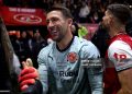 FLEETWOOD, ENGLAND - OCTOBER 27: Jay Lynch of Fleetwood Town celebrates after the Carabao Cup Fourth Round match between Fleetwood Town and Arsenal at Highbury Stadium on October 27, 2026 in Fleetwood, England. (Photo by Carl Recine/Getty Images)